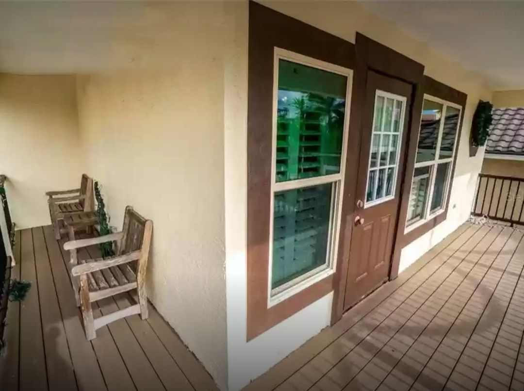 wood deck with chairs and doors image